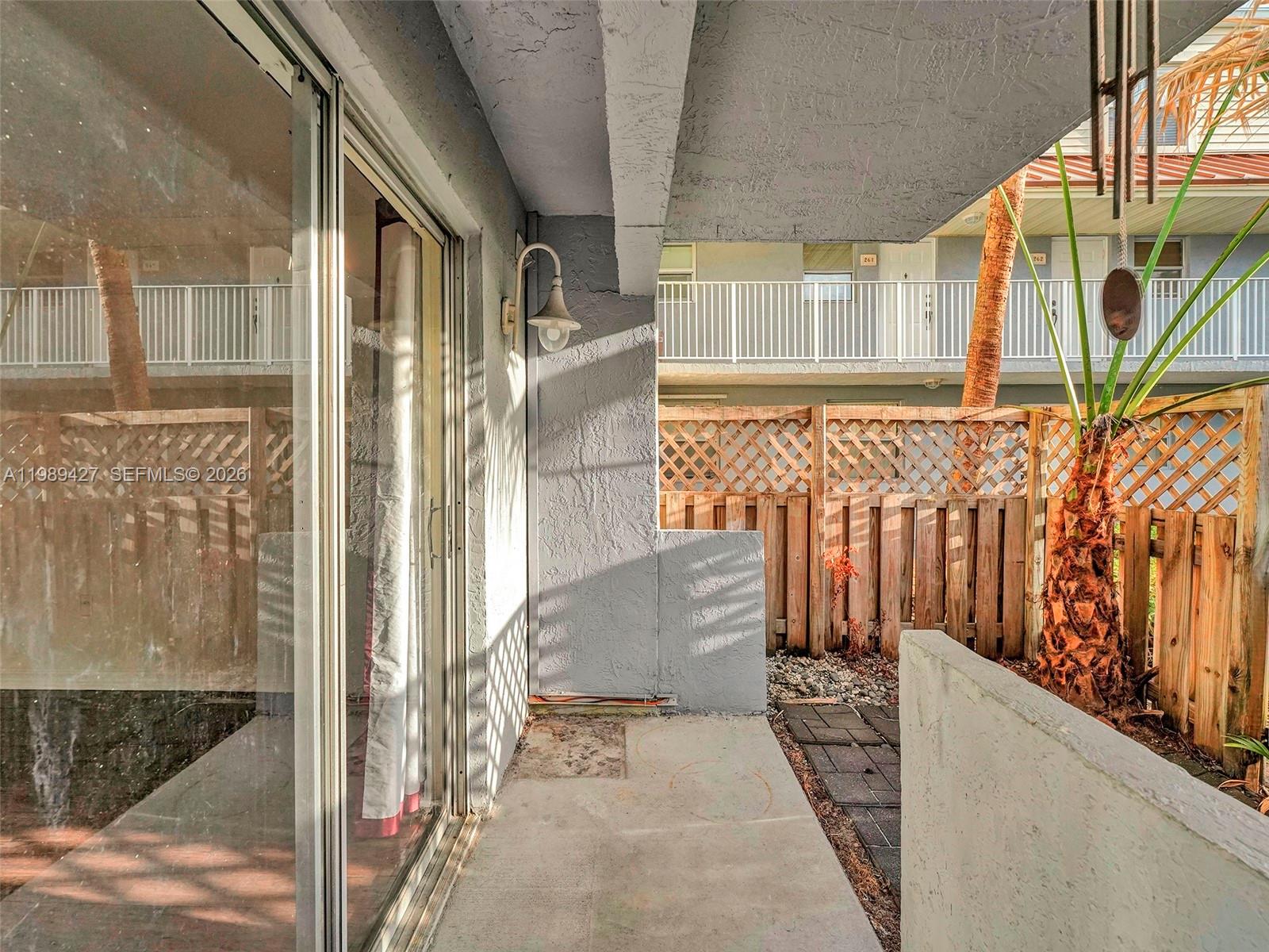 4600 Southwest 67th Avenue, Unit 155 Miami, FL 33155 - Photo 21 of 32 a view of a door and wooden floor