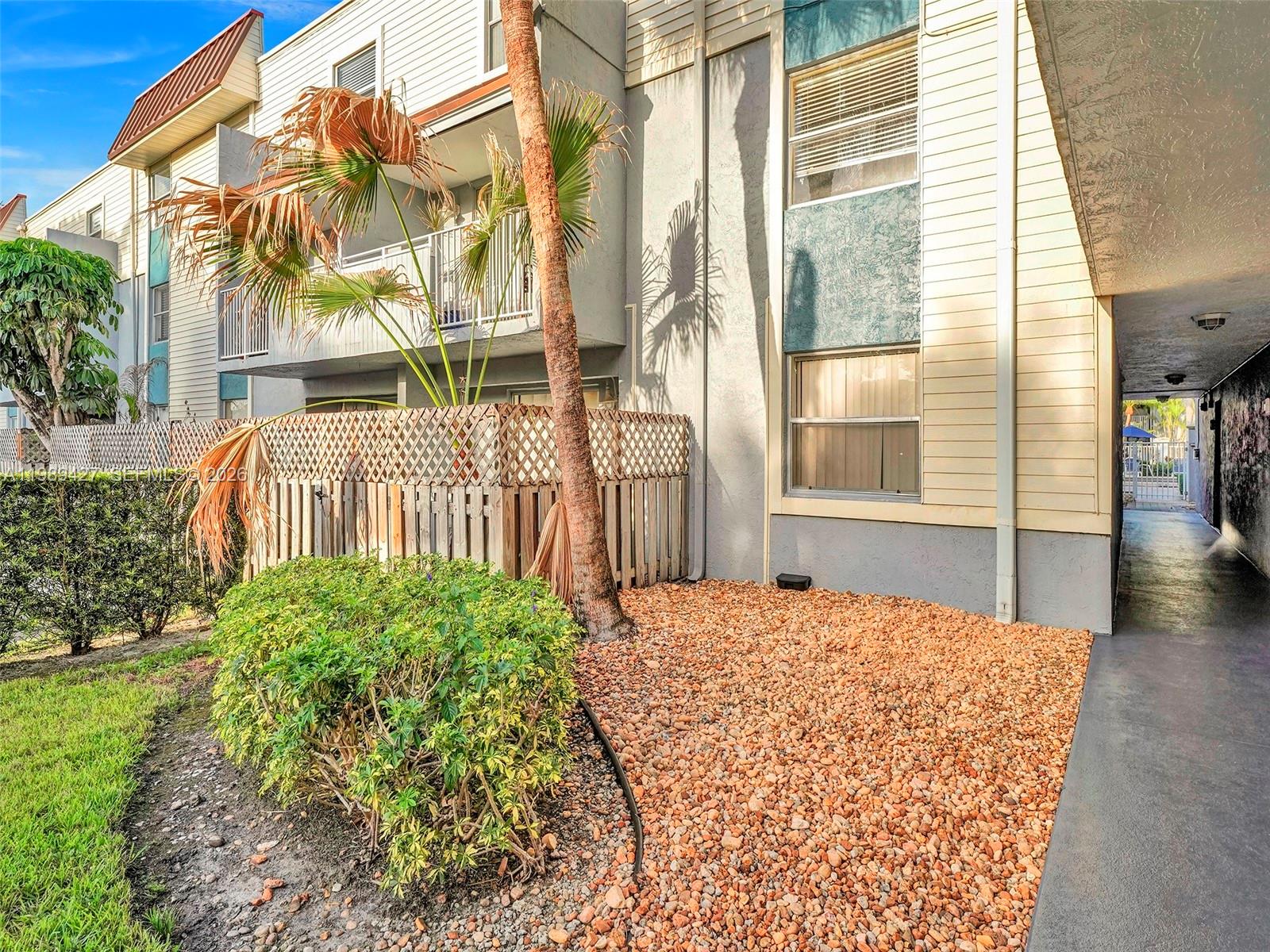 4600 Southwest 67th Avenue, Unit 155 Miami, FL 33155 - Photo 27 of 32 a house view with a garden space