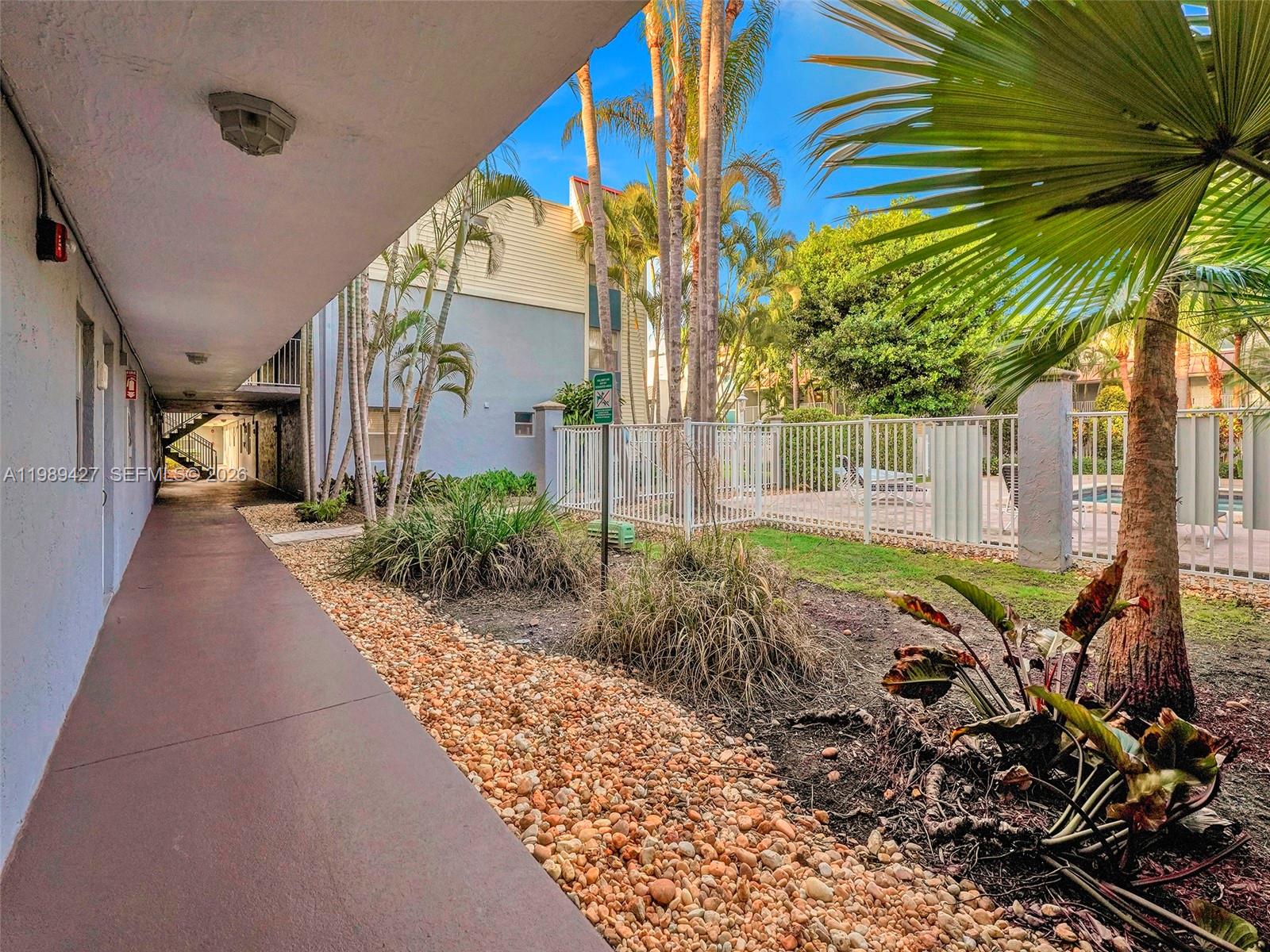 4600 Southwest 67th Avenue, Unit 155 Miami, FL 33155 - Photo 29 of 32 a view of a house with a yard