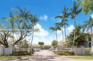 4600 Southwest 67th Avenue, Unit 155 Miami, FL 33155 - Photo 31 of 32 a view of a backyard with palm trees