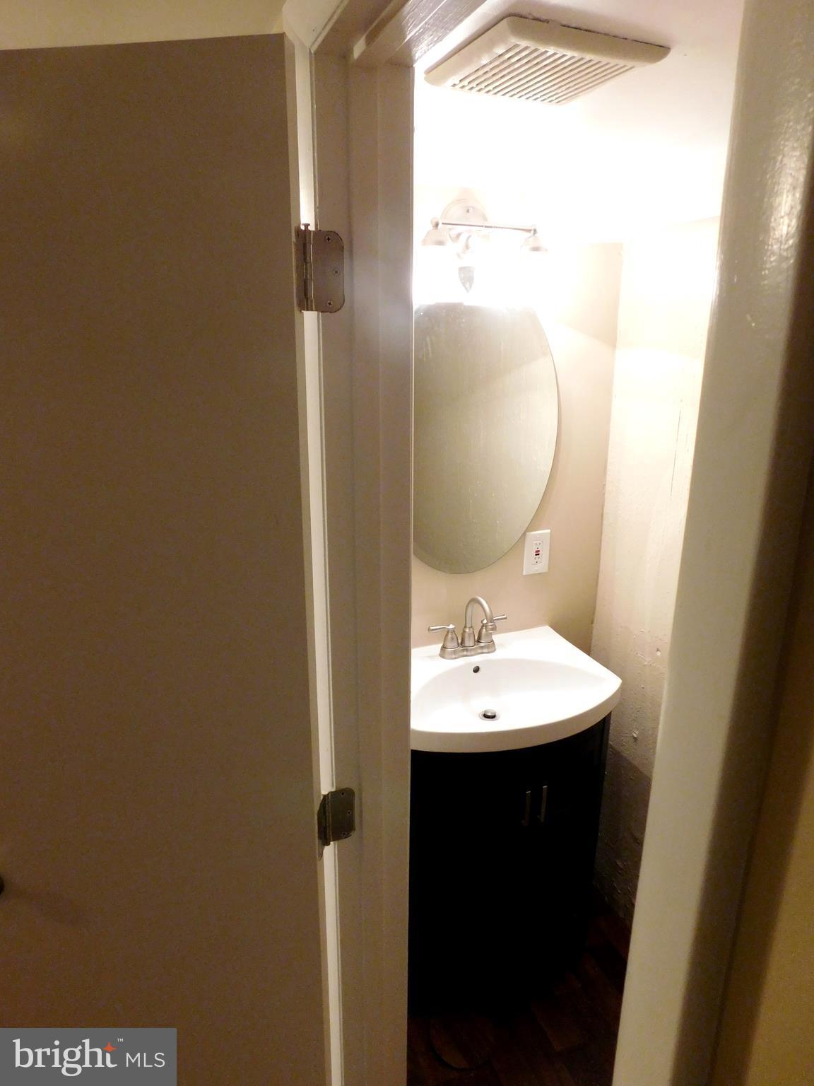 5610 Sagra Road Baltimore, MD 21239 - Photo 28 of 30 Lower Level Half Bath (Master)