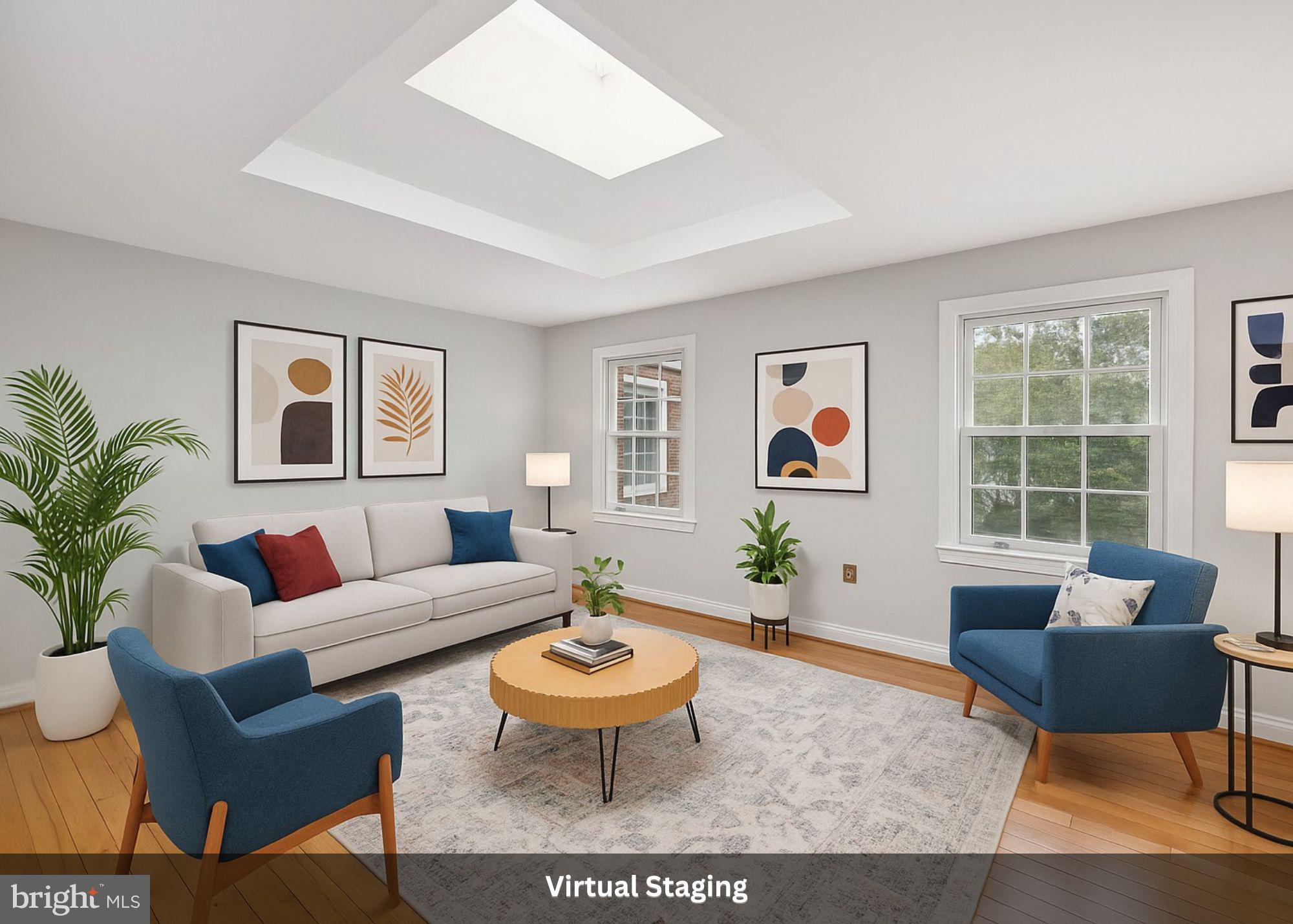2904 13th Road South, Unit 301 Arlington, VA 22204 - Photo 2 of 13 a living room with furniture potted plant and wooden floor