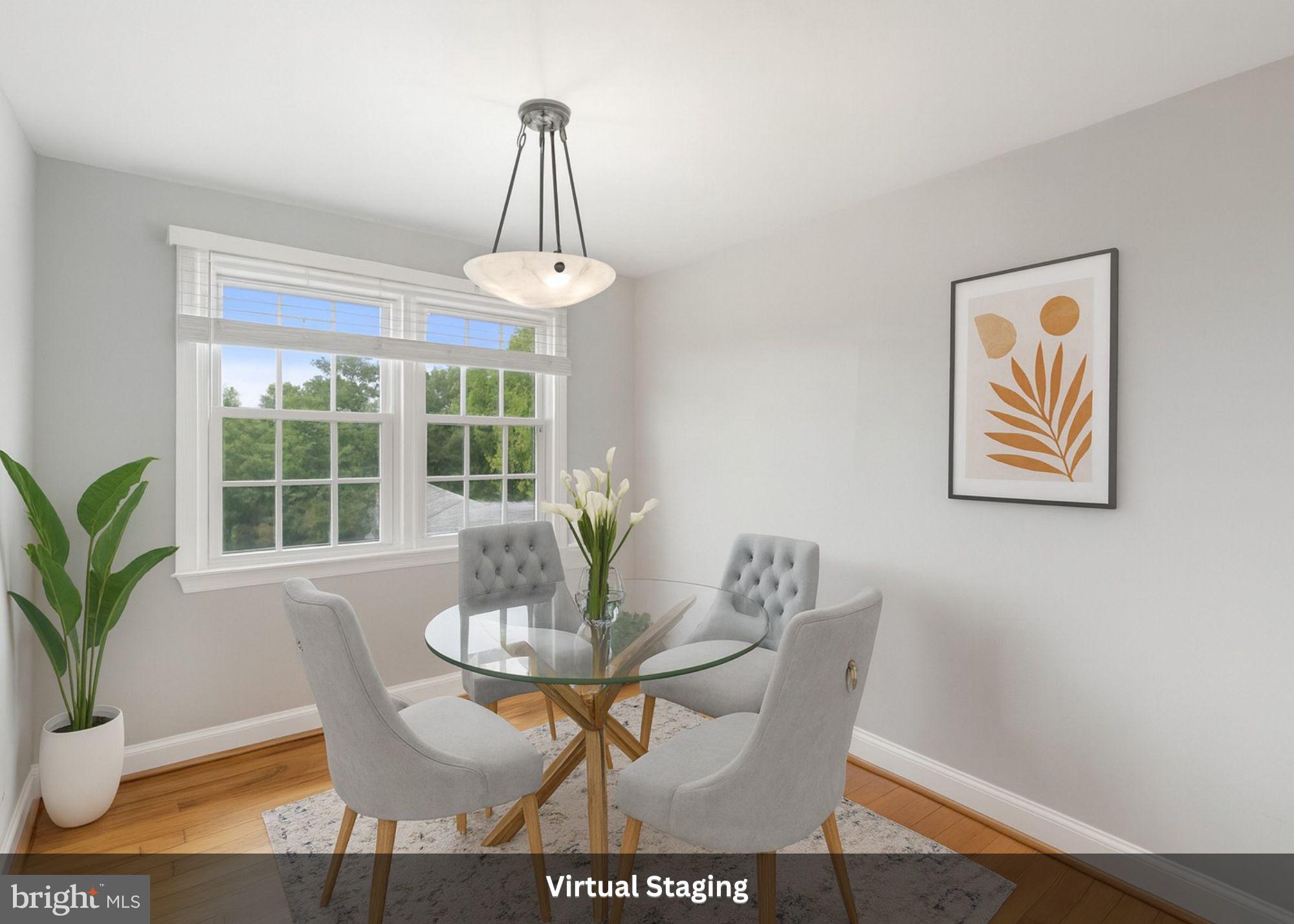 2904 13th Road South, Unit 301 Arlington, VA 22204 - Photo 4 of 13 a view of a dining room with furniture window and outside view