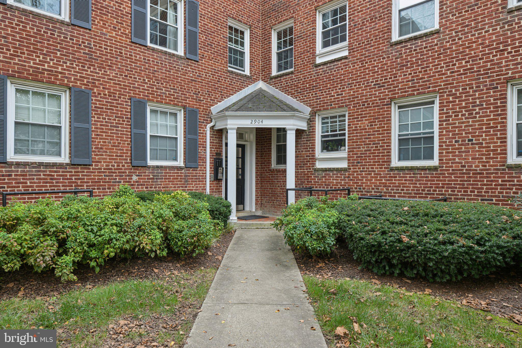 2904 13th Road South, Unit 301 Arlington, VA 22204 - Photo 10 of 13 a front view of a house with garden