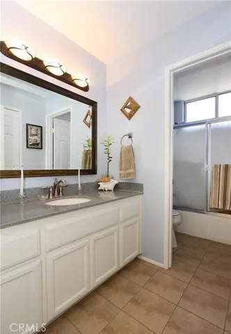 a view of a bedroom from a hallway