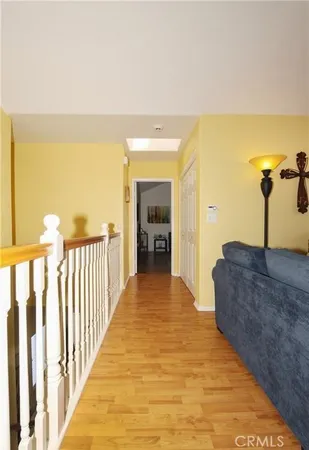 a view of a kitchen from a hallway