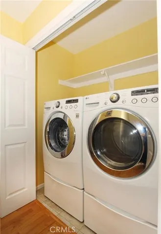 a view of a house with potted plants