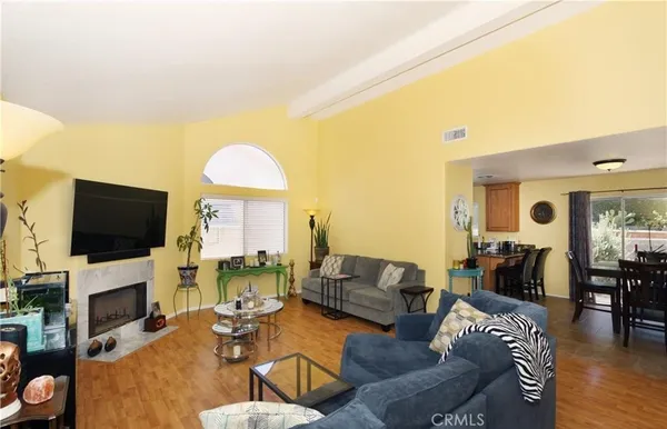 a view of a dining room with furniture and window