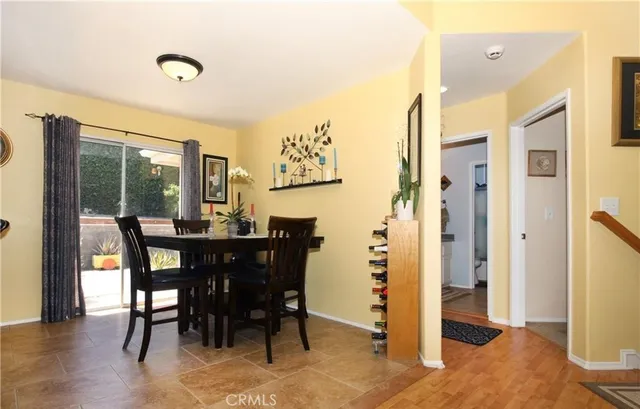 a kitchen with a sink stove and refrigerator
