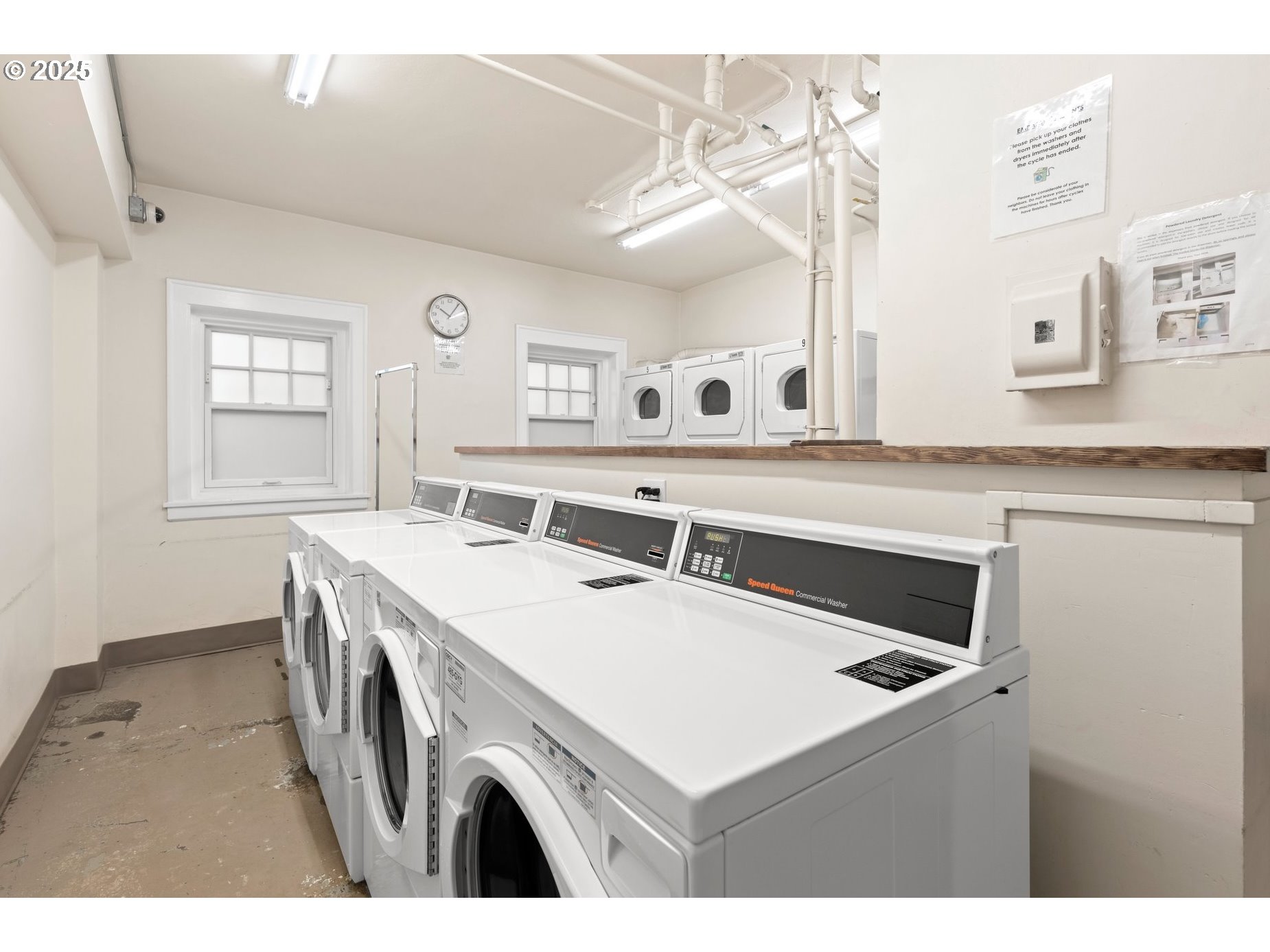 2015 Northwest Flanders Street, Unit 408 Portland, OR 97209 - Photo 27 of 37 a utility room with dryer and washer