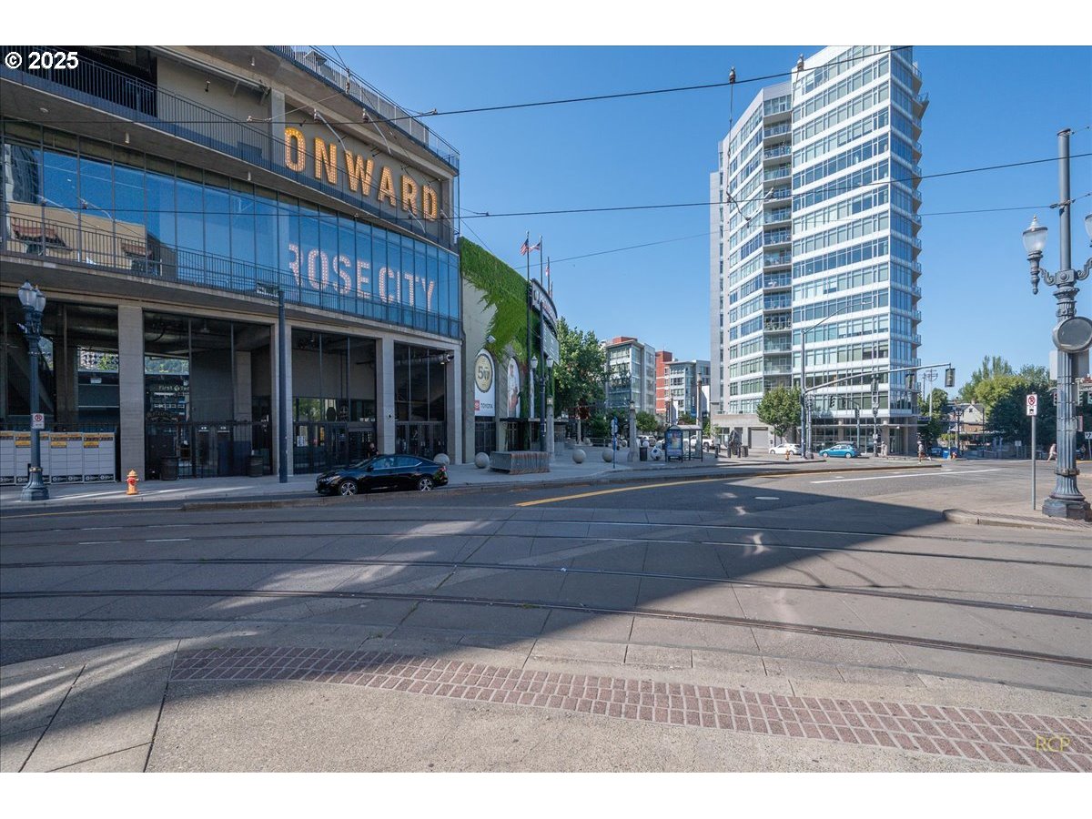 2015 Northwest Flanders Street, Unit 408 Portland, OR 97209 - Photo 34 of 37 a view of a building and a people
