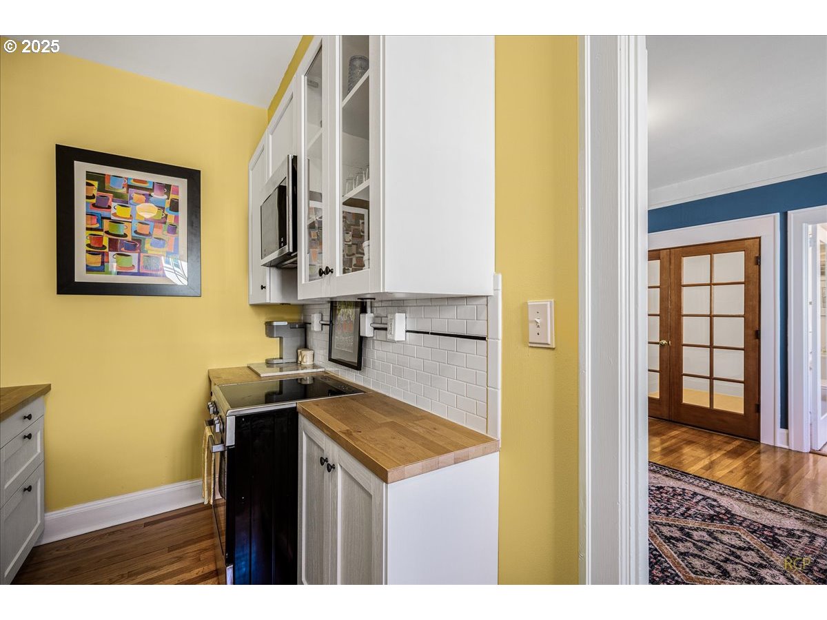 2015 Northwest Flanders Street, Unit 408 Portland, OR 97209 - Photo 8 of 37 a utility room with a sink a washer and dryer