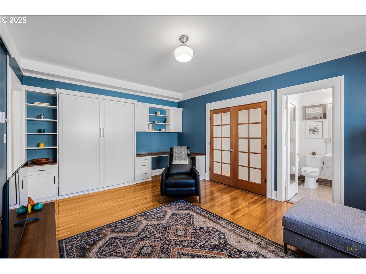 2015 Northwest Flanders Street, Unit 408 Portland, OR 97209 - Photo 9 of 37 a living room with furniture and a window