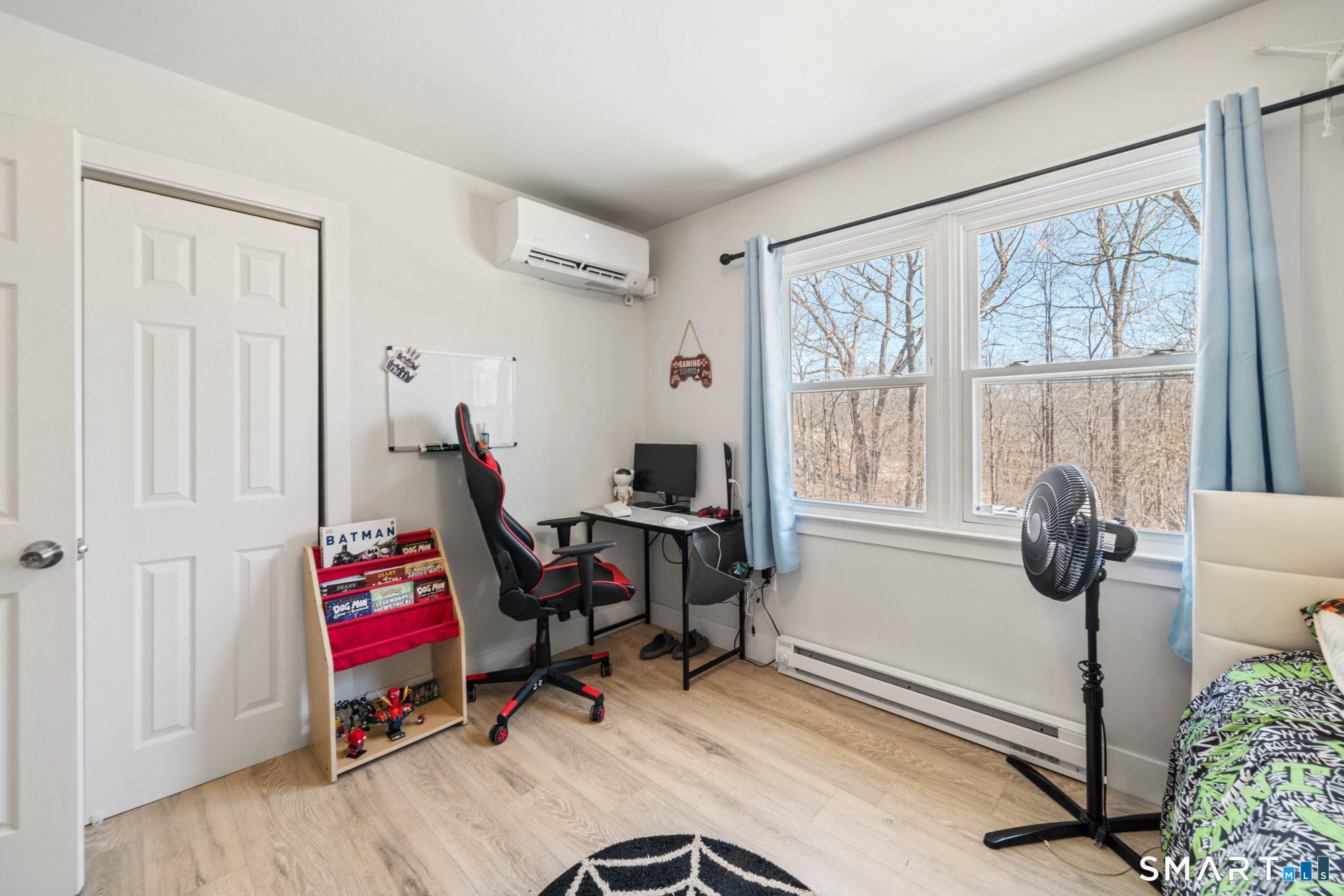 327 Lakeside Boulevard West Waterbury, CT 06708 - Photo 16 of 29 a view of a workspace with furniture and a window