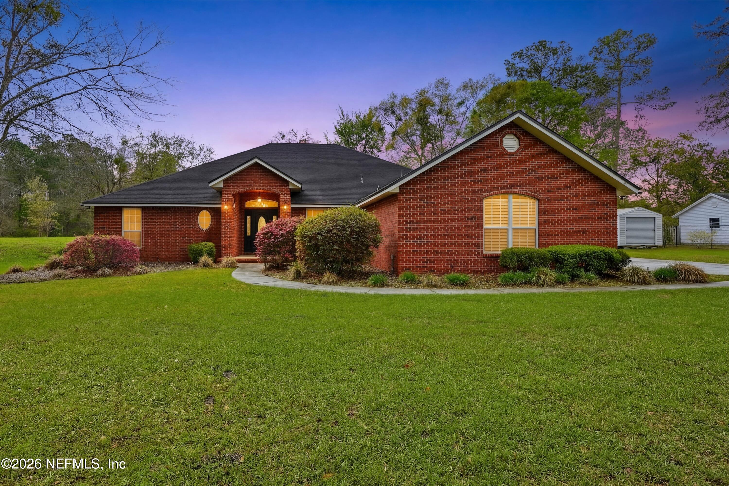 14520 Braddock Road Jacksonville, FL 32218 - Photo 2 of 35 Twilight Front