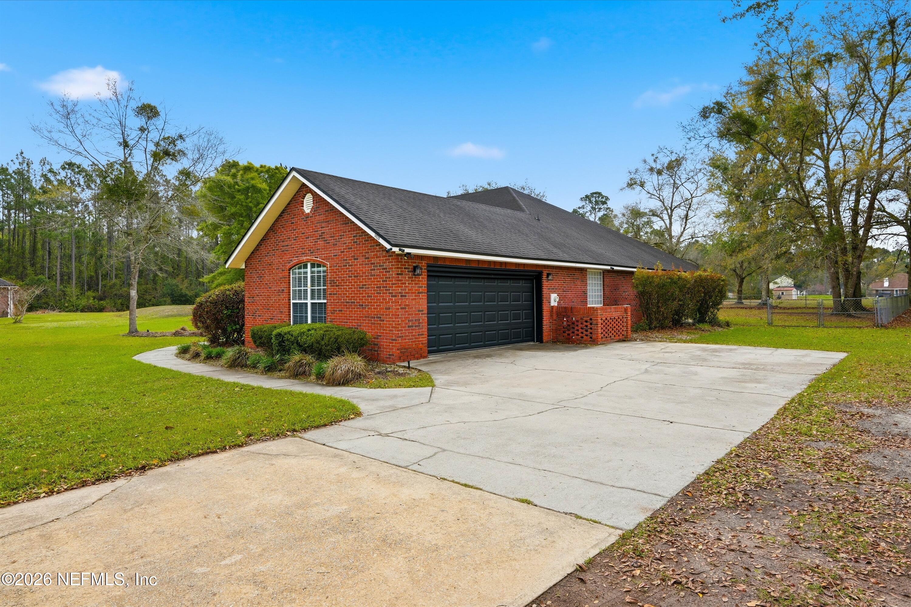 14520 Braddock Road Jacksonville, FL 32218 - Photo 30 of 35 Side Entry Garage