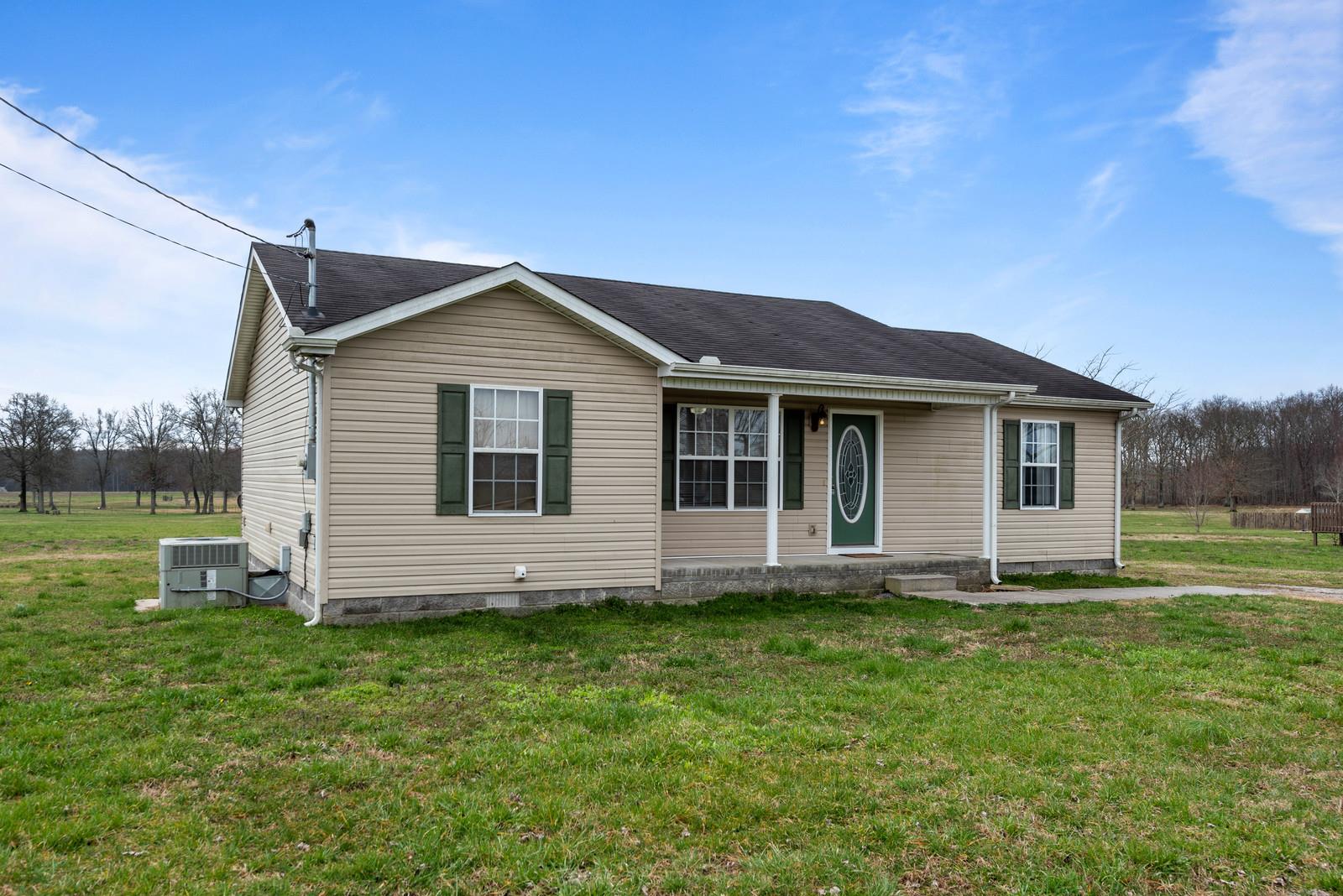 109 Spry Road Morrison, TN 37357 - Photo 3 of 30 a view of a house with a yard