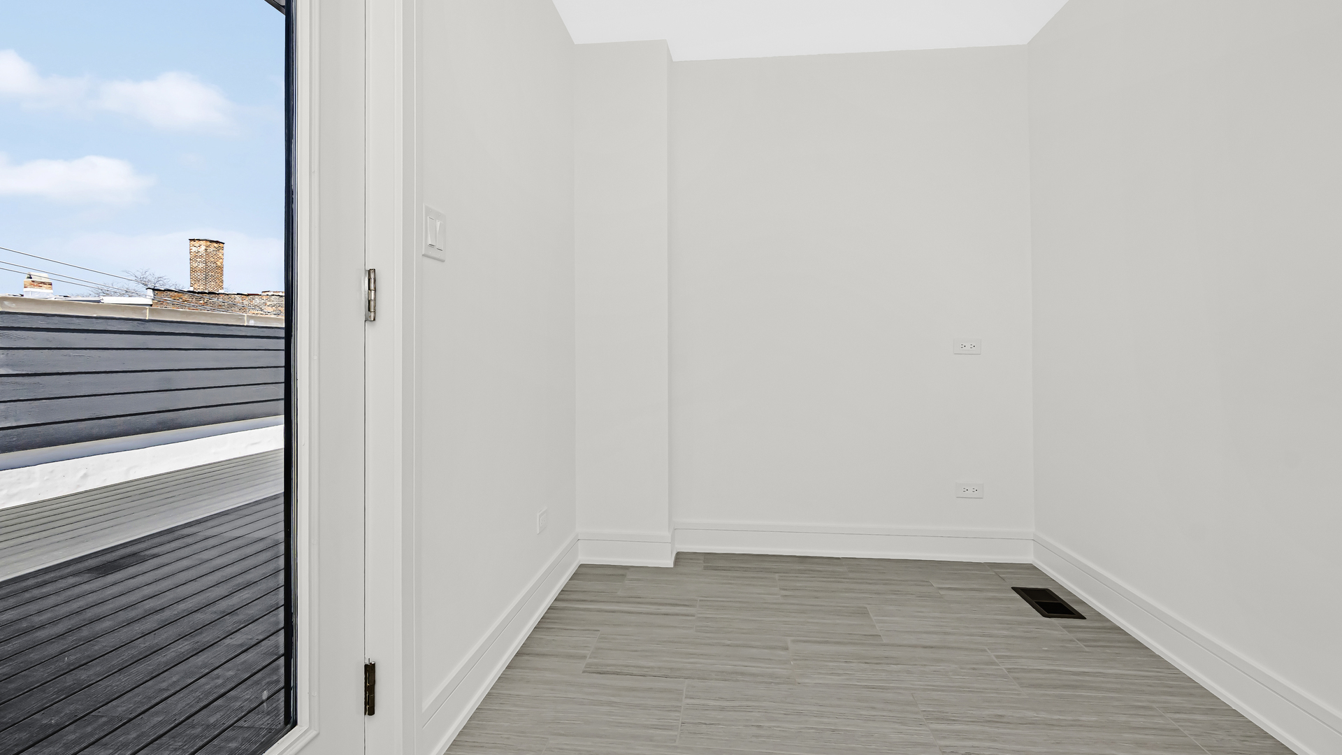 336 East Pershing Road Chicago, IL 60653 - Photo 23 of 44 a view of a closet area with wooden floor