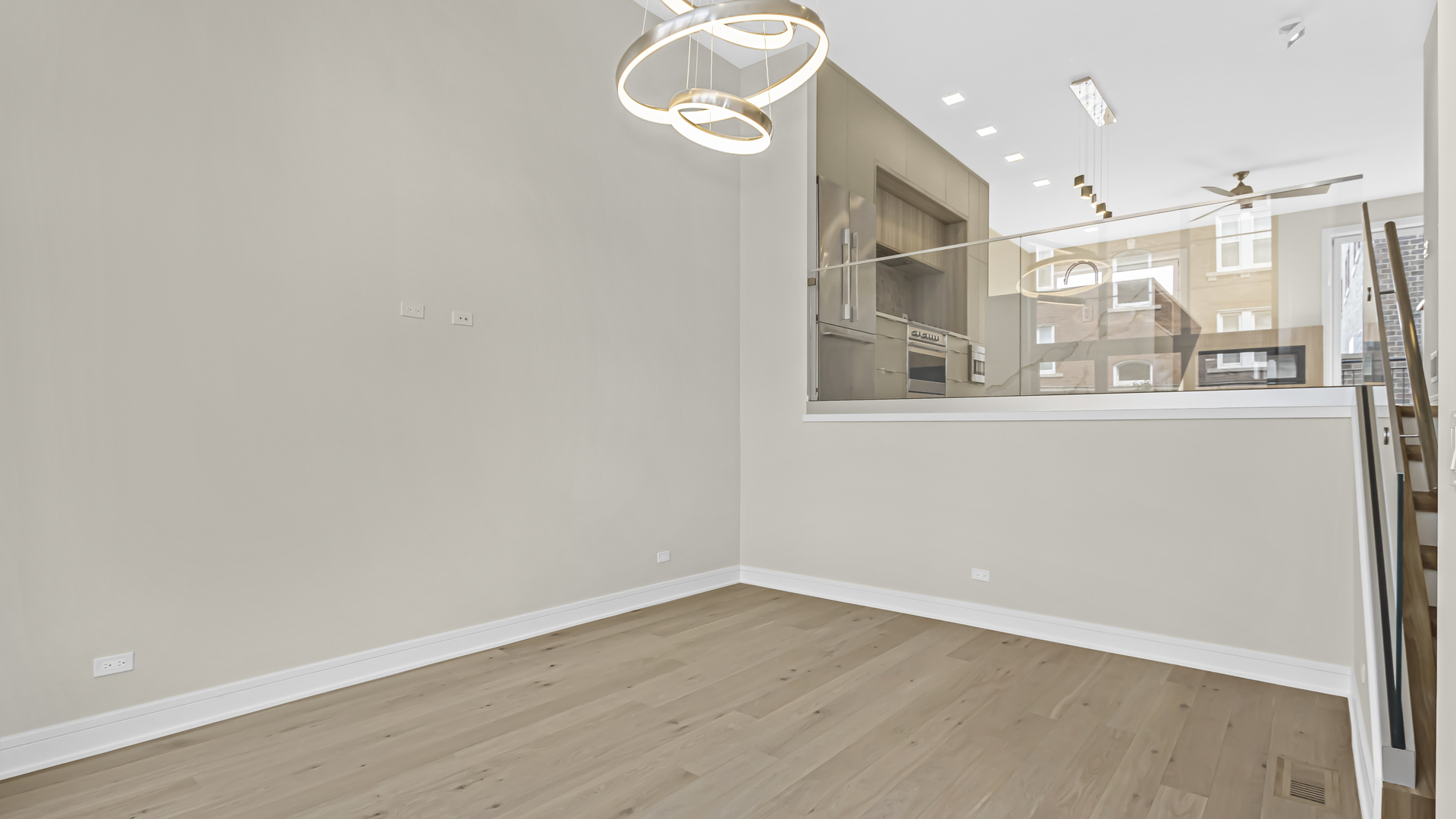 336 East Pershing Road Chicago, IL 60653 - Photo 6 of 44 an empty room with wooden floor and windows