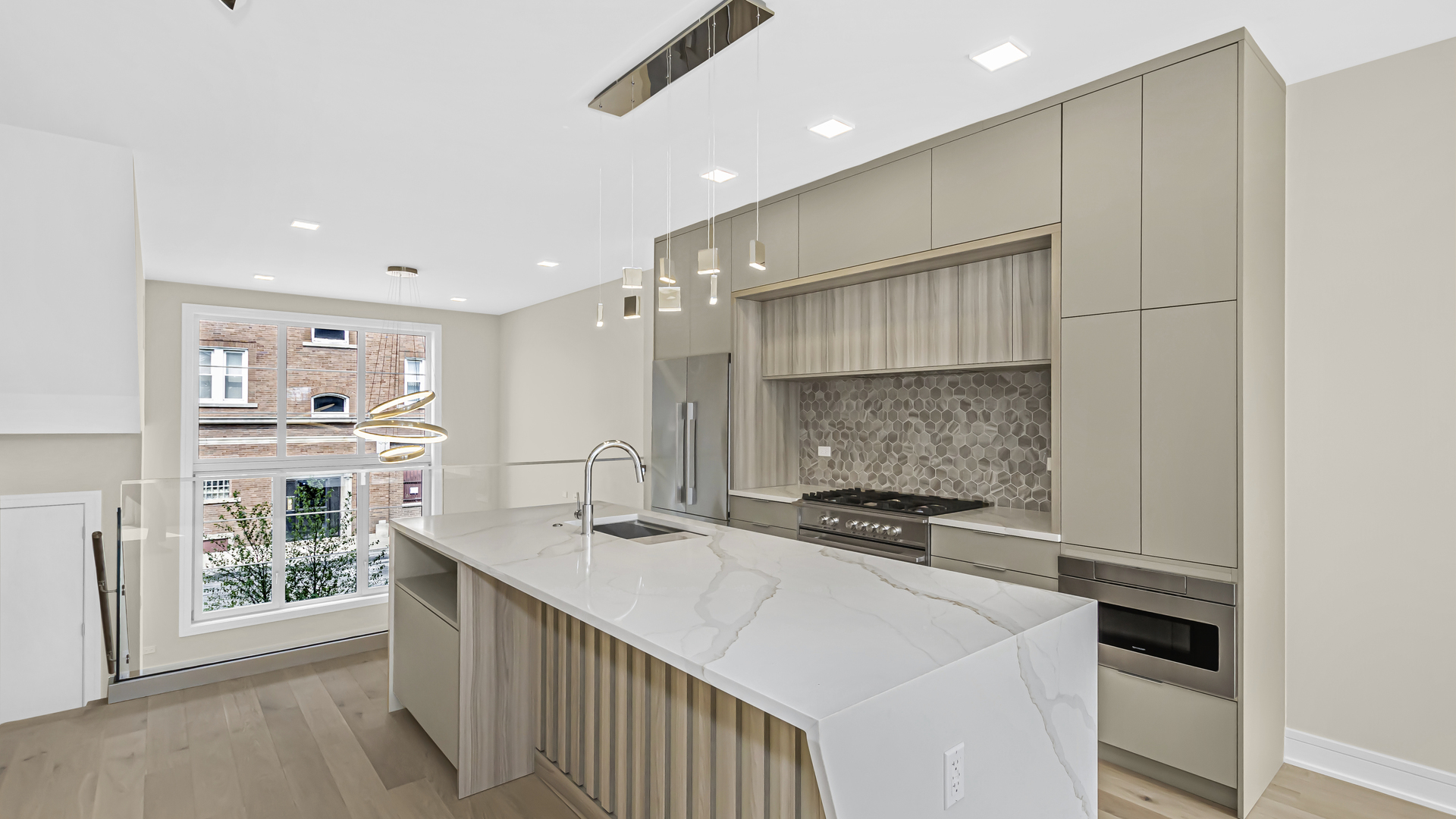 336 East Pershing Road Chicago, IL 60653 - Photo 9 of 44 a kitchen with a sink a stove and cabinets