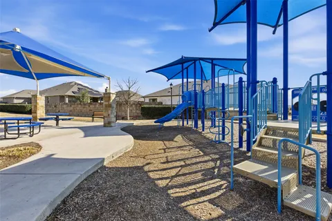 a view of a house with swimming pool