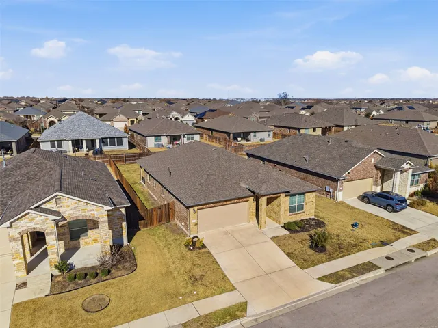an aerial view of ocean and beach