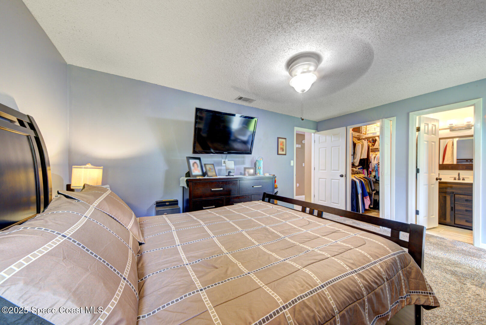 5370 Holden Road Cocoa, FL 32927 - Photo 21 of 38 master bedroom with ensuite