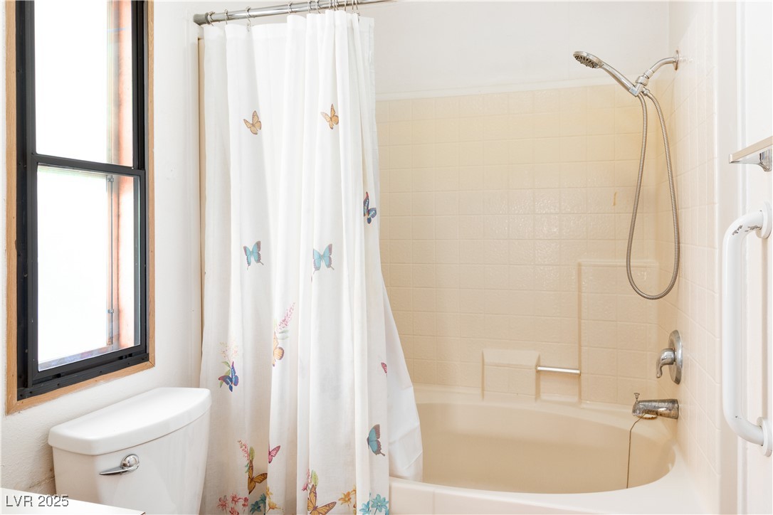 1671 Granada Street Laughlin, NV 89029 - Photo 25 of 63 Full bath featuring toilet and shower / tub combo