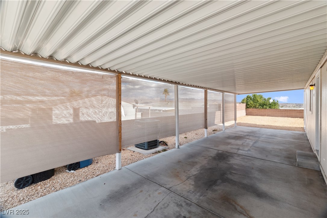 1671 Granada Street Laughlin, NV 89029 - Photo 32 of 63 View of parking
featuring access to backyard