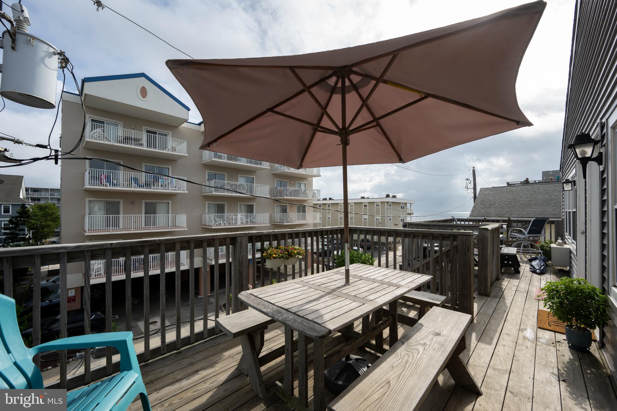 9 79th Street, Unit 3W Ocean City, MD 21842 - Photo 17 of 34 a view of a balcony with furniture
