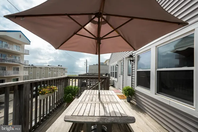 a view of balcony with furniture