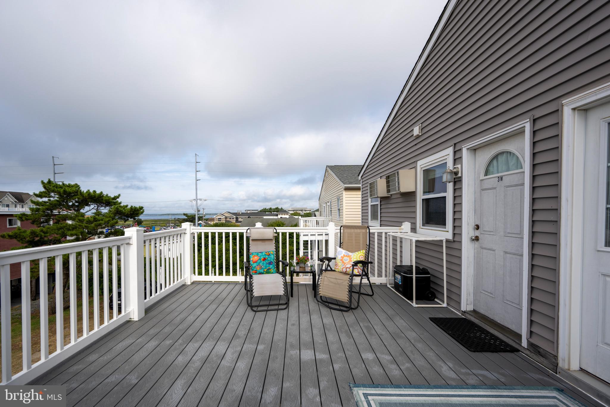 9 79th Street, Unit 3W Ocean City, MD 21842 - Photo 26 of 34 a view of a house with a deck