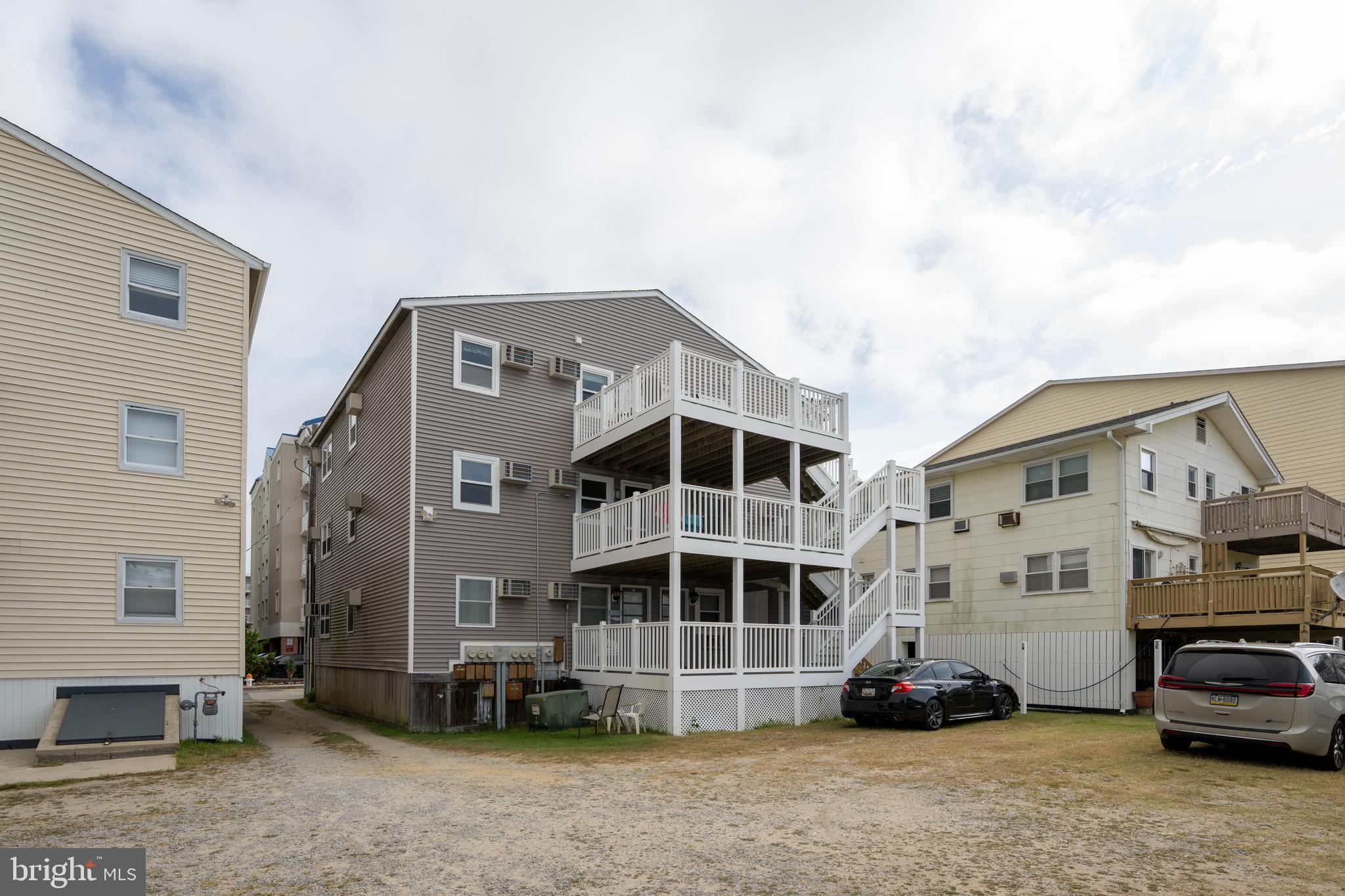 9 79th Street, Unit 3W Ocean City, MD 21842 - Photo 27 of 34 a view of a cars park in front of house