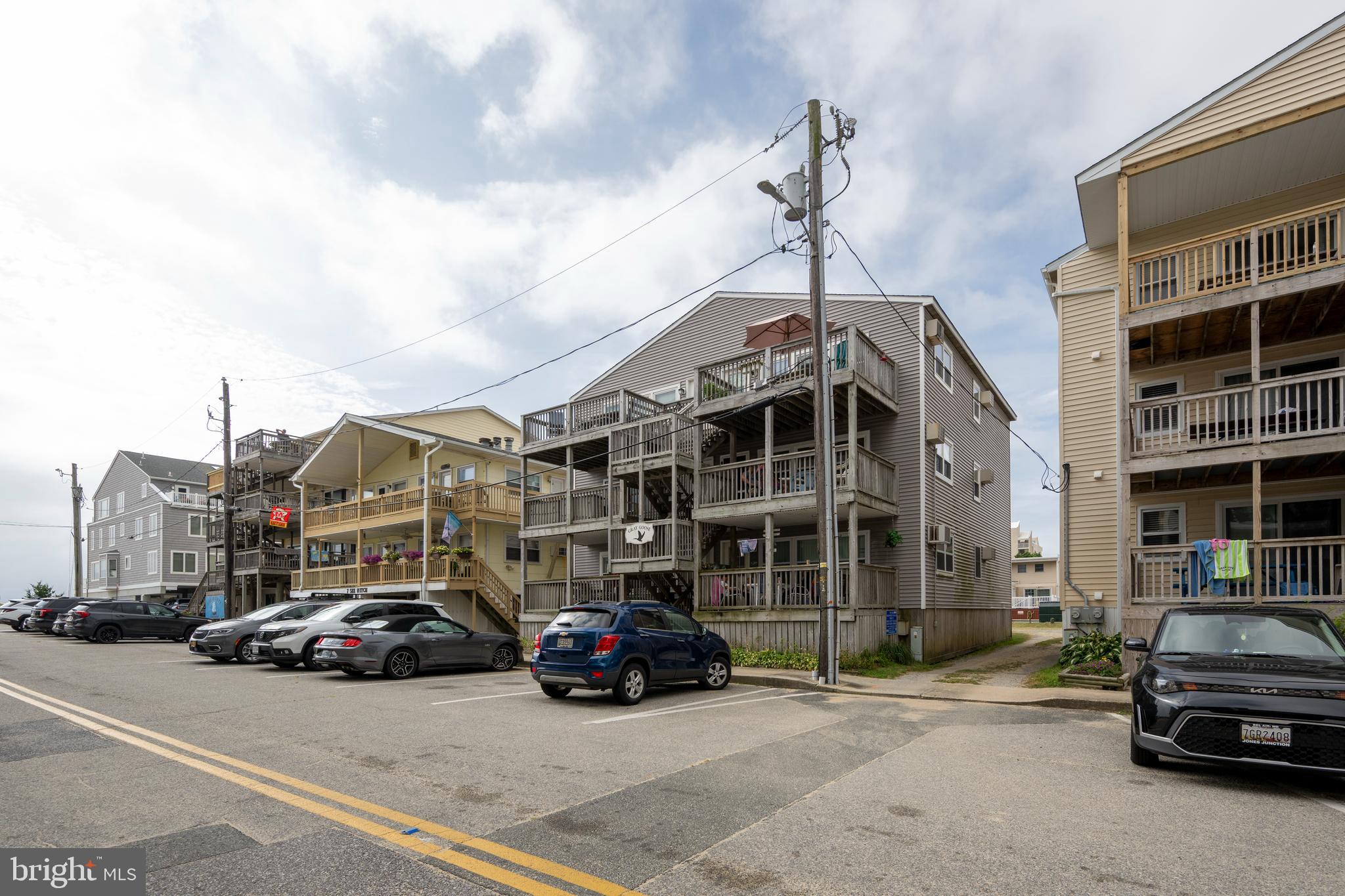 9 79th Street, Unit 3W Ocean City, MD 21842 - Photo 28 of 34 a car parked in front of a building