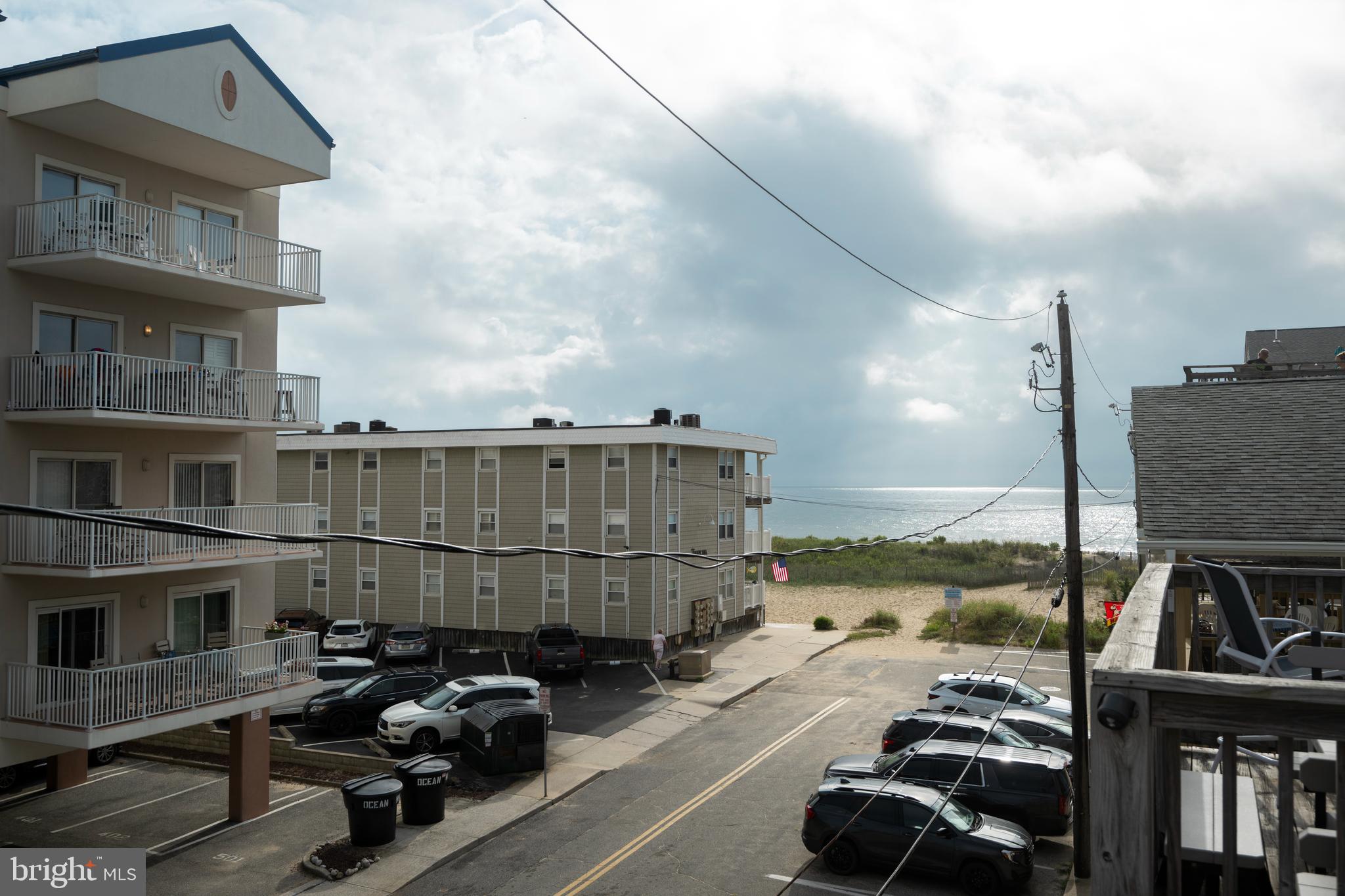 9 79th Street, Unit 3W Ocean City, MD 21842 - Photo 4 of 34 a view of a street with cars