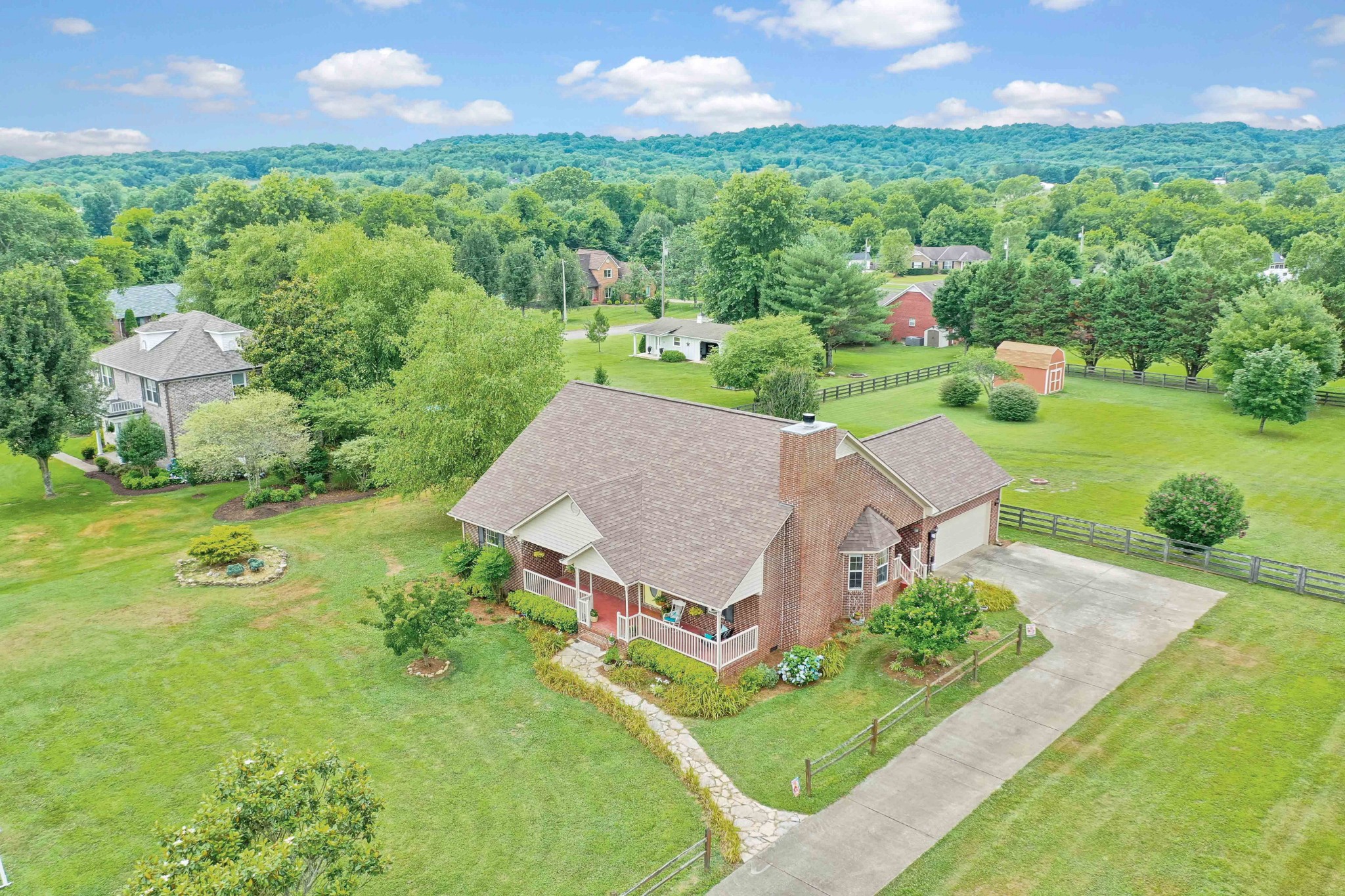 1926 Victorian Road Columbia, TN 38401 - Photo 1 of 28 an aerial view of a house with yard tennis court and outdoor seating