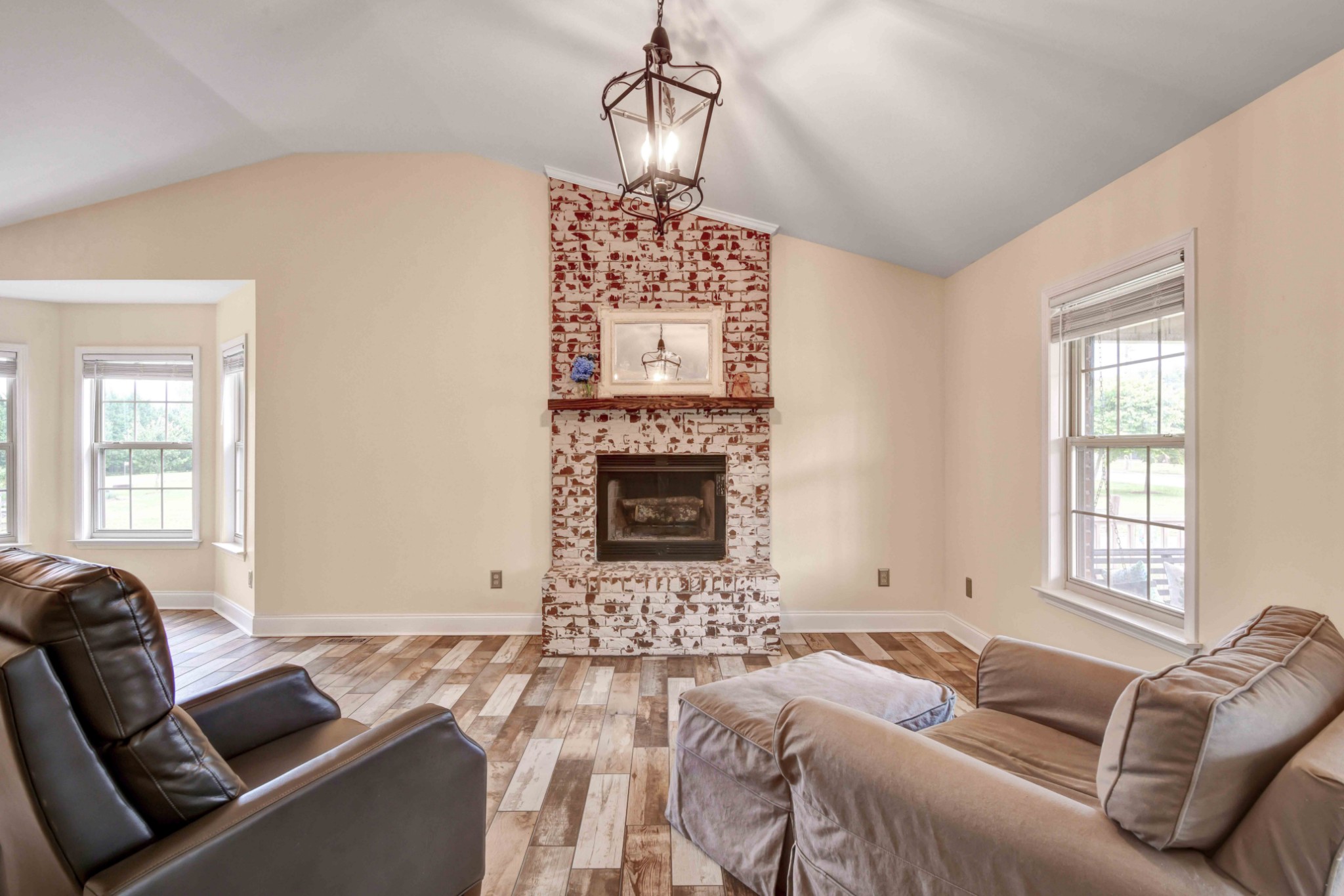 1926 Victorian Road Columbia, TN 38401 - Photo 6 of 28 a living room with furniture a fireplace and a window