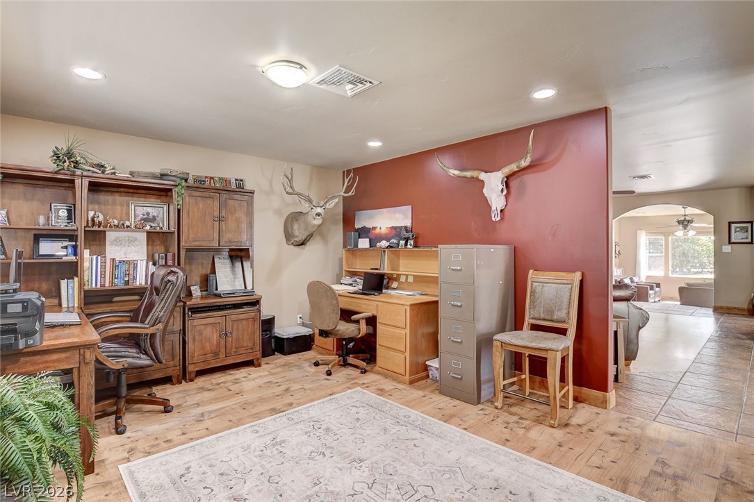1950 Bowman Road Logandale, NV 89021 - Photo 23 of 81 A dedicated home office provides ample space for productivity and organization.