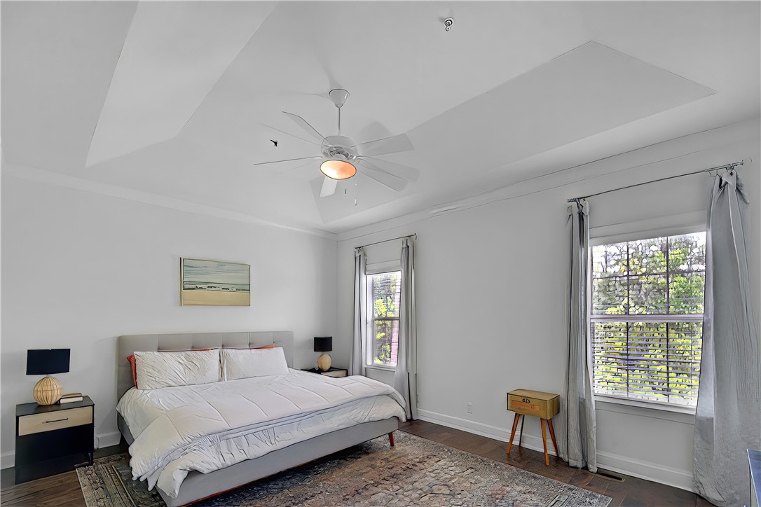 803 Mariners Circle St. Simons Island, GA 31522 - Photo 13 of 28 Primary bedroom also has hardwood flooring