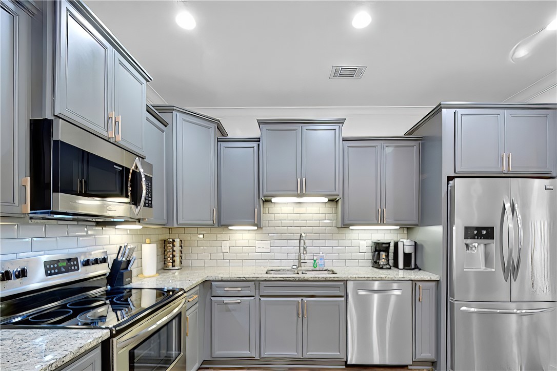 803 Mariners Circle St. Simons Island, GA 31522 - Photo 5 of 28 Upgraded appliances and a quiet Bosch dishwasher.