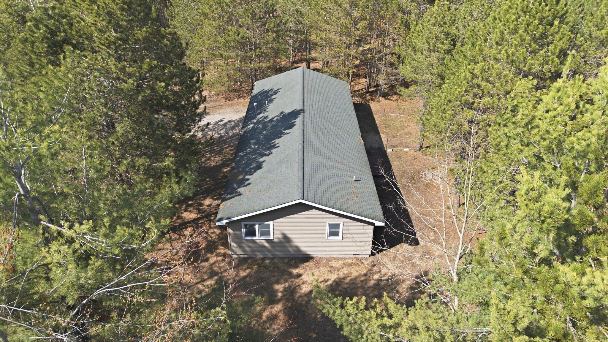 10262 North Black River Road Cheboygan, MI 49721 - Photo 2 of 41 Nestled In The Woods