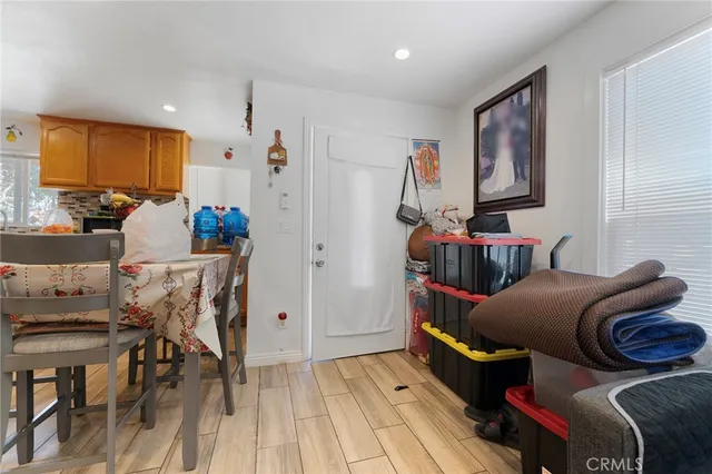 a room with furniture and a flat screen tv