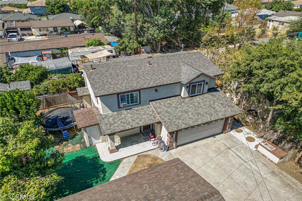 9127 Greenleaf Avenue Whittier, CA 90602 - Photo 18 of 39 an aerial view of a house with a yard table and chairs