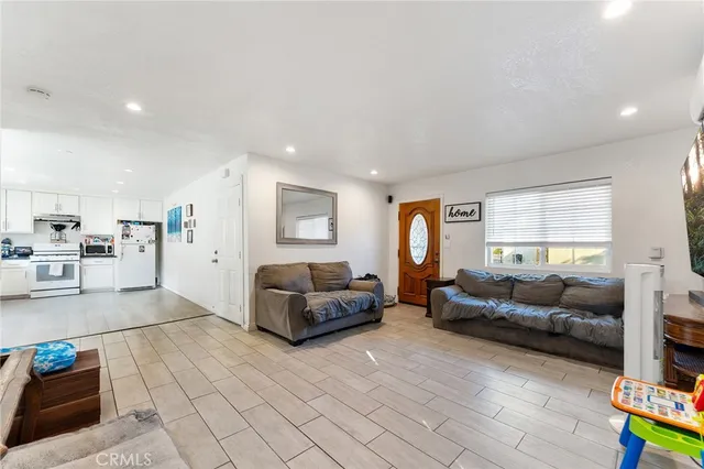a living room with furniture and a couch