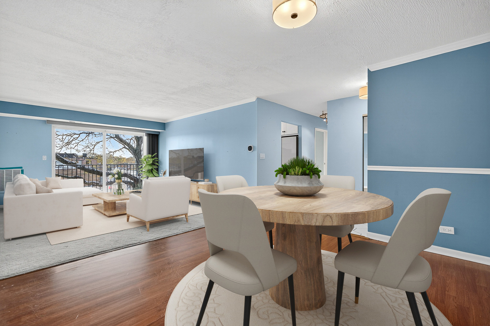 500 West Huntington Commons Road, Unit 253 Mount Prospect, IL 60056 - Photo 2 of 24 a view of a dining room with furniture window and wooden floor