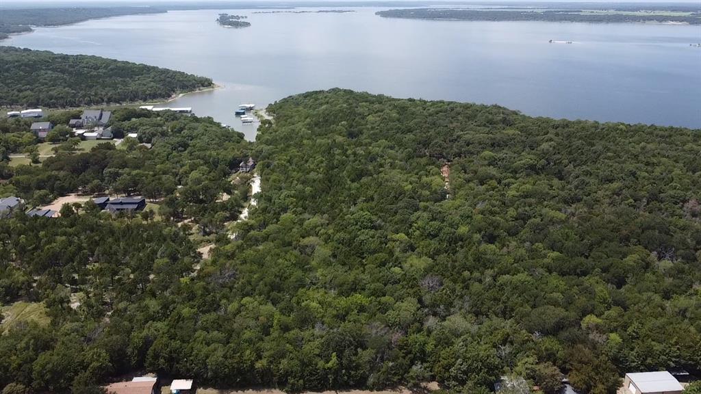 Tbd 3rd Street Pottsboro, TX 75076 - Photo 11 of 31 an aerial view of a houses with a yard