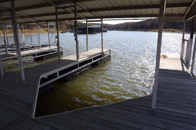 a room with window and pool table