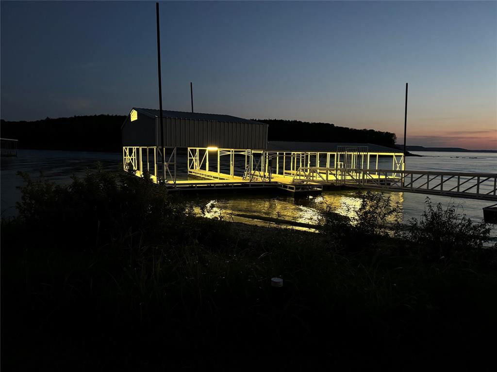 Tbd 3rd Street Pottsboro, TX 75076 - Photo 22 of 31 a view of roof deck with a table and chairs