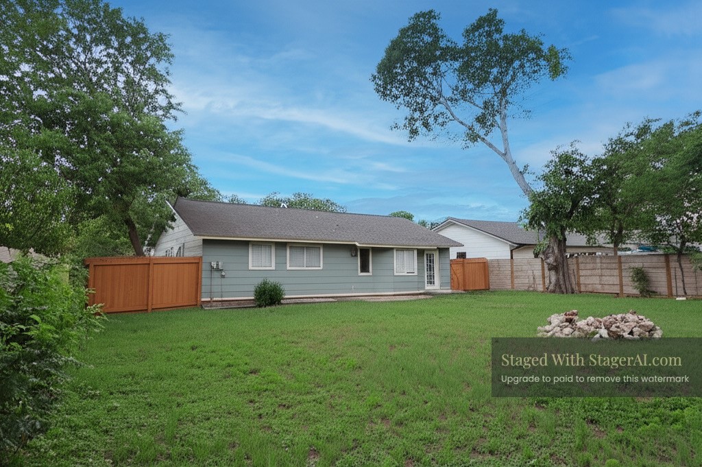 1704 Cherry Orchard Drive Austin, TX 78745 - Photo 4 of 7 front view of a house with a yard