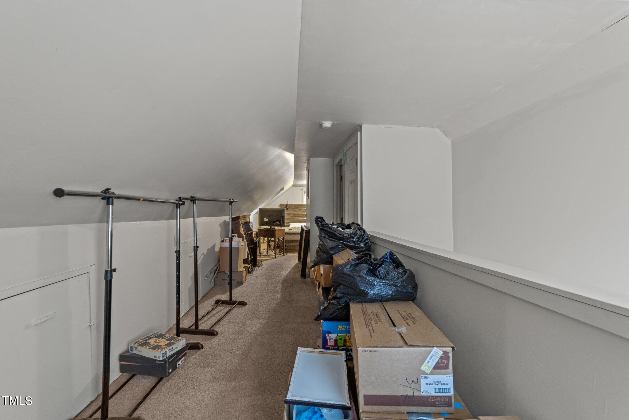 313 Colleton Road Raleigh, NC 27610 - Photo 16 of 32 a view of a room with gym equipment